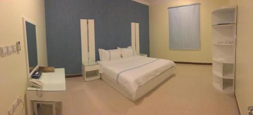Postel nebo postele na pokoji v ubytování Open Hotel Buraiyda