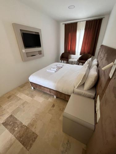 Postel nebo postele na pokoji v ubytování kai urla