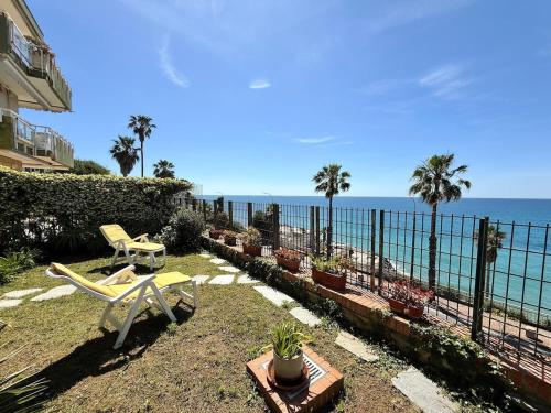 a patio with a view of the ocean at Suite Mazzini 177 - Sanremo in Sanremo