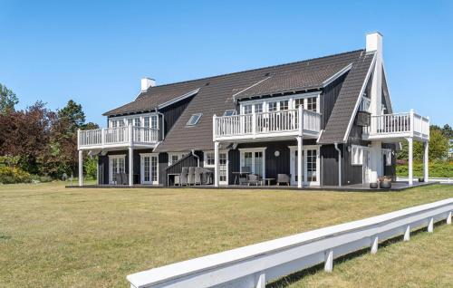 a large house with a large yard at Apartment Klint Strandvej Nykøbing Sj Vi in Højby