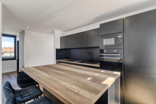 Dapur atau dapur kecil di La Cosy - chambre en colocation