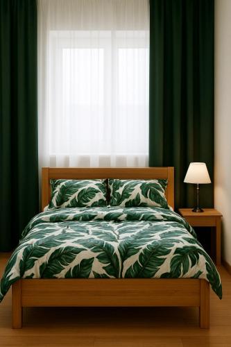 Ένα ή περισσότερα κρεβάτια σε δωμάτιο στο TK Apartments Namysłów