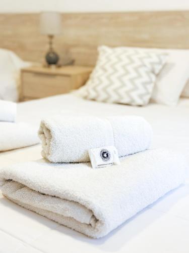 Ένα ή περισσότερα κρεβάτια σε δωμάτιο στο HOTEL PUCARA y RENT A CAR