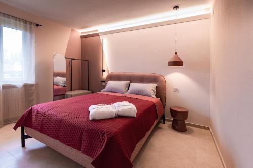 Ένα ή περισσότερα κρεβάτια σε δωμάτιο στο Agriturismo CarpinoNero
