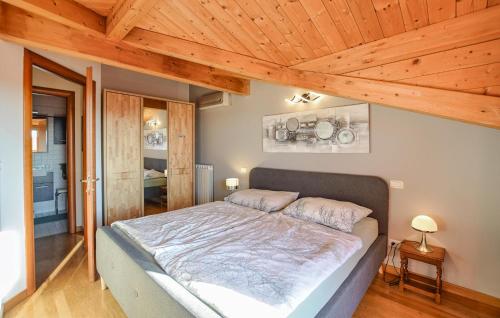 Katil atau katil-katil dalam bilik di Cozy Apartment In Grado