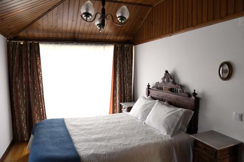 เตียงในห้องที่ Casa Do Carvalho