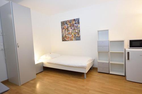 Postel nebo postele na pokoji v ubytování Practical studio at trendy location - Stork 22