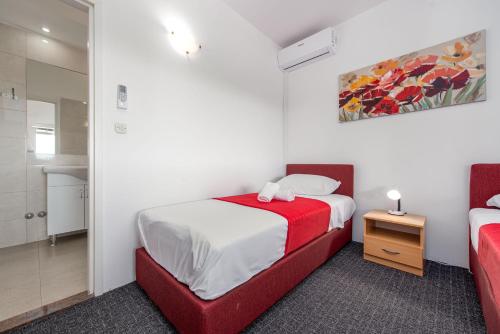 Katil atau katil-katil dalam bilik di Villa Dandelion ZadarVillas