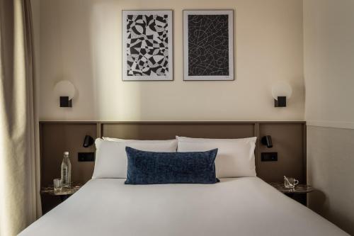 Postel nebo postele na pokoji v ubytování BYPILLOW Sinfonía