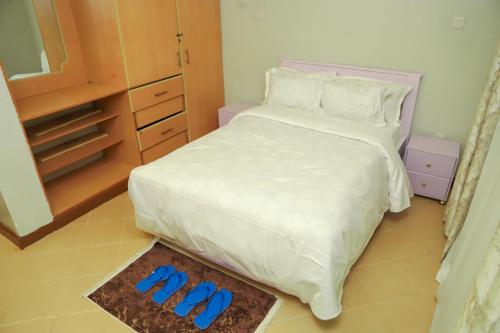 Katil atau katil-katil dalam bilik di Casa Haven Homestay Naivasha