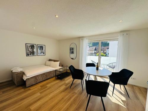 Postel nebo postele na pokoji v ubytování Bonnystay Lörrach l Balcony l Center l Design