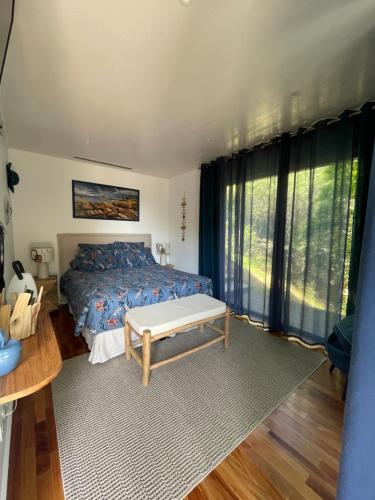 Ένα ή περισσότερα κρεβάτια σε δωμάτιο στο Chambre d'hôtes A Vadina Porticcio