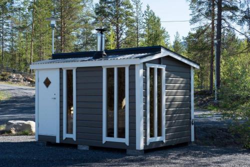 a small shed with a pitched roof at Sauna cabin | Pets allowed | Engine heater in Lofsdalen