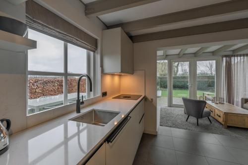 Kuchyň nebo kuchyňský kout v ubytování Villa Magnolia