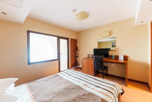 Katil atau katil-katil dalam bilik di Hotel Crisana Arad