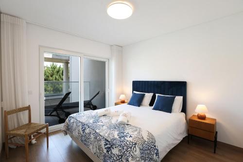 En eller flere senge i et værelse på T1-Fortuna - Sea in plain sight