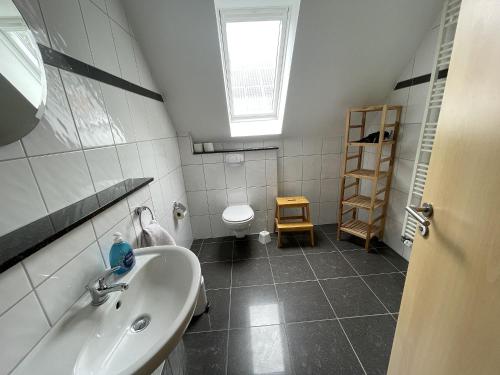 Koupelna v ubytování Usedom Bike Hotel & Suites