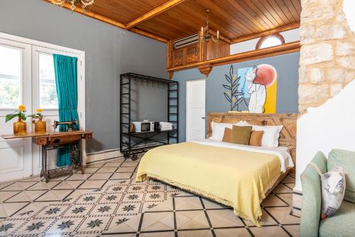 Llit o llits en una habitació de Arnaoon Village