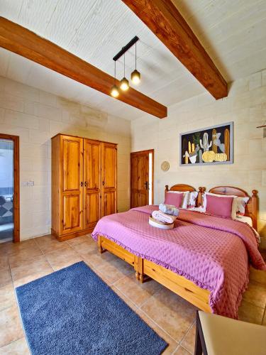 Llit o llits en una habitació de Sunny Villa