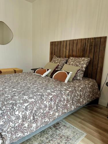 Postel nebo postele na pokoji v ubytování L Échappée Gauloise en hypercentre