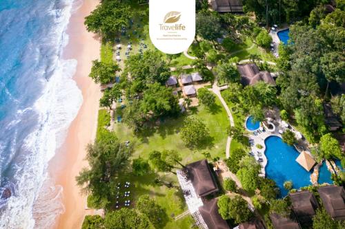 an overhead view of the beach and the ocean at Khaolak Merlin Resort in Khao Lak