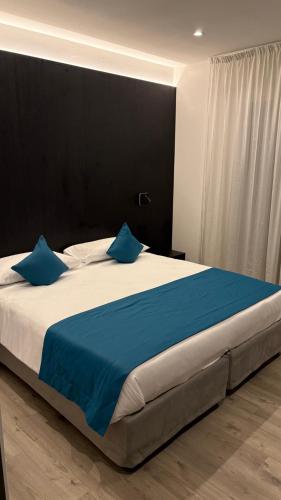 Postel nebo postele na pokoji v ubytování Albergo Cappello e Cadore