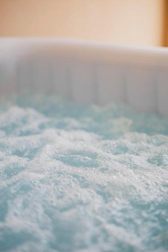 a close up of snow on the ground at Villa ElSi, Where Relaxation and Elegance Meet in Valenzano