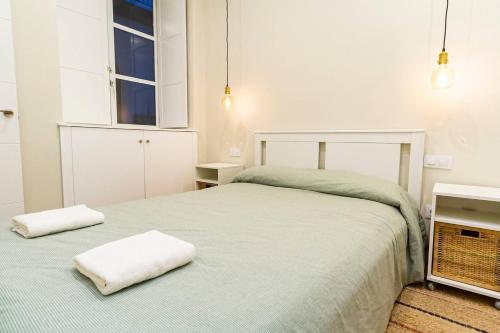 Postel nebo postele na pokoji v ubytování SH Casa Candelaria Apartamento en el centro