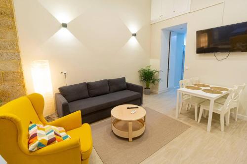 TV a/nebo společenská místnost v ubytování SH Casa Candelaria Apartamento en el centro
