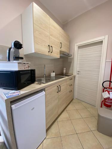 Kuchyň nebo kuchyňský kout v ubytování Donna Teresa Casa Vacanze