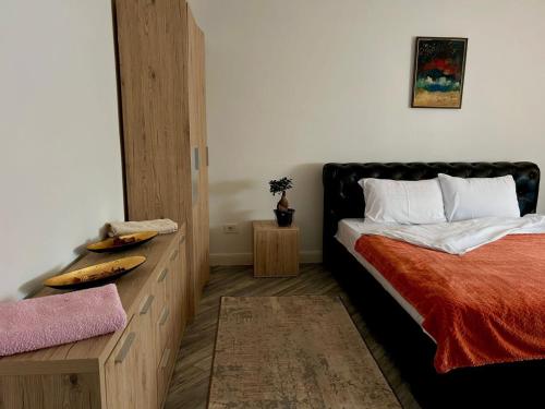 Postel nebo postele na pokoji v ubytování Down town Apartment
