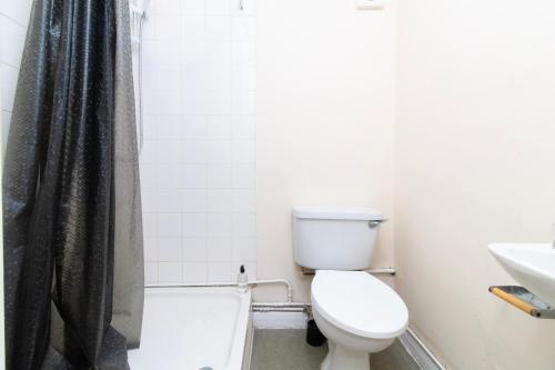 a bathroom with a toilet and a sink at Brookvale Guest House Room 14 in Southampton