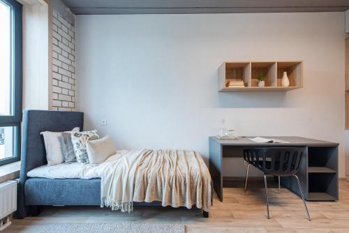 Ένα ή περισσότερα κρεβάτια σε δωμάτιο στο SHED Coliving studio