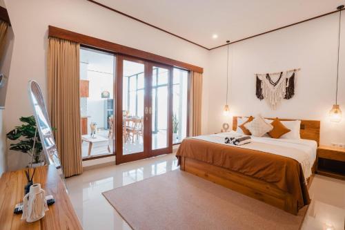 Postel nebo postele na pokoji v ubytování Villa Eve, 3 mins from La Brisa