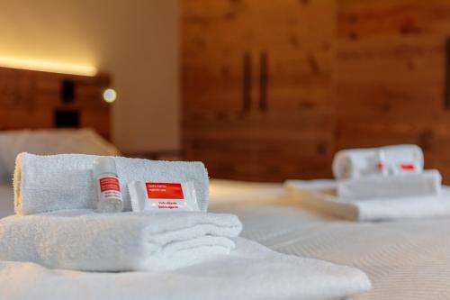 Ένα ή περισσότερα κρεβάτια σε δωμάτιο στο Chalet Eden Blanc