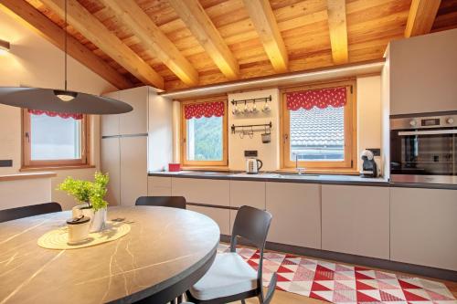 Η κουζίνα ή μικρή κουζίνα στο Chalet Eden Blanc