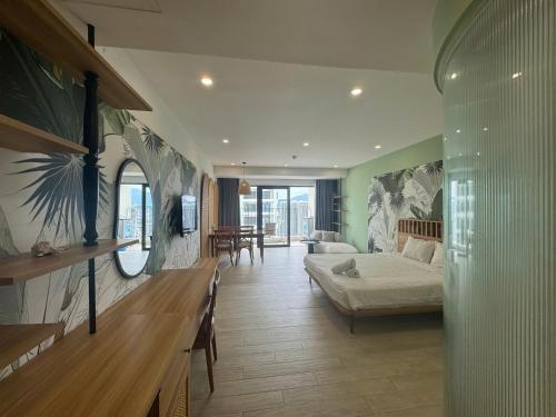 En eller flere senge i et værelse på Golden Land