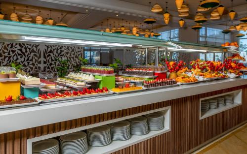 a buffet line with many different types of food at Steigenberger Marhaba Thalasso Hammamet in Hammamet