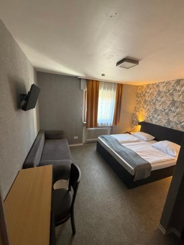 Postel nebo postele na pokoji v ubytování Parkhotel Lindenhof - KOSTENLOSE PARKPLÄTZE