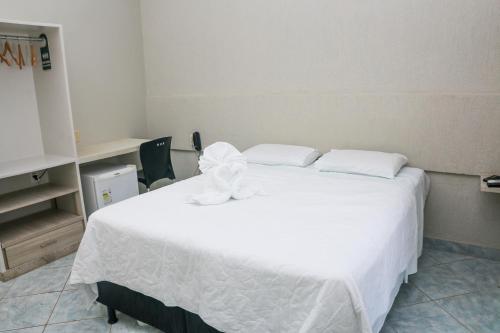 Xingu Praia Hotelにあるベッド