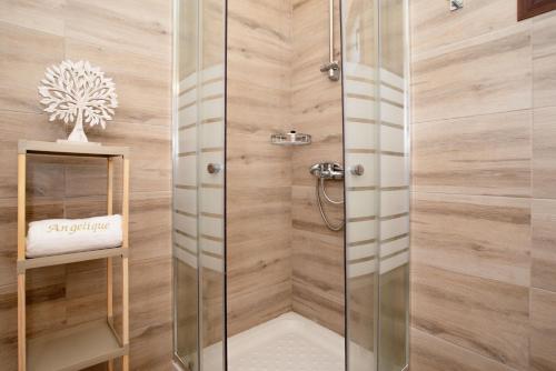 A bathroom at Angelique Apartments