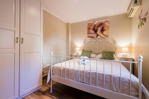 Кровать или кровати в номере Serenity Beach apartments