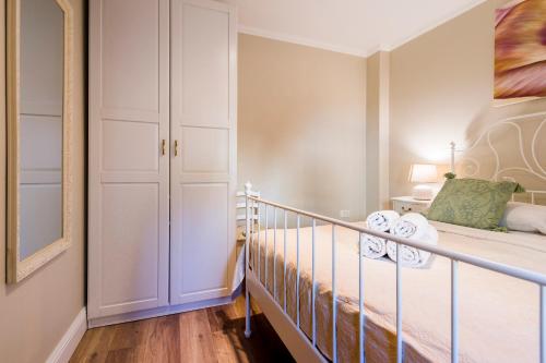 Кровать или кровати в номере Serenity Beach apartments