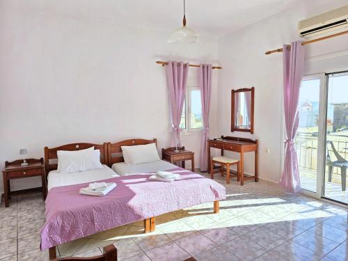 Postel nebo postele na pokoji v ubytování Inna Rooms