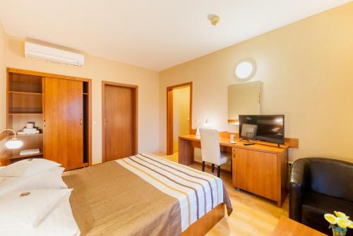 Katil atau katil-katil dalam bilik di Hotel Crisana Arad