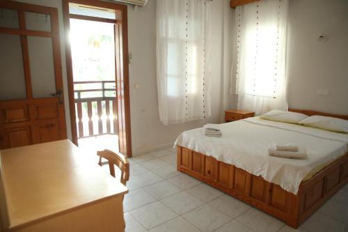 Ένα ή περισσότερα κρεβάτια σε δωμάτιο στο Summer Life Villa Apart