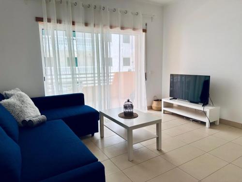 TV a/nebo společenská místnost v ubytování Apartamento Conceição de Tavira