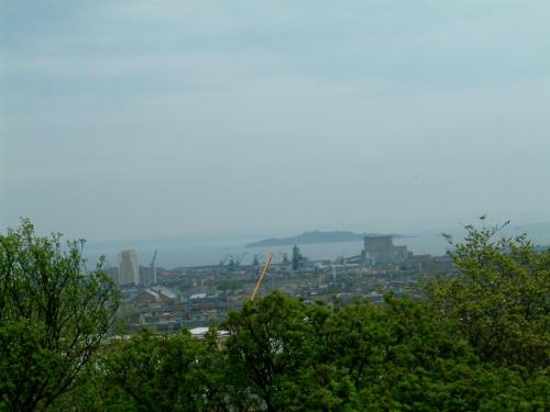 a view of a city with trees in the foreground at Terrace hotel in Edinburgh