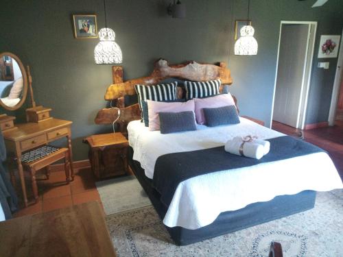 a bedroom with a large bed and a mirror at Hilton Castle in Hilton