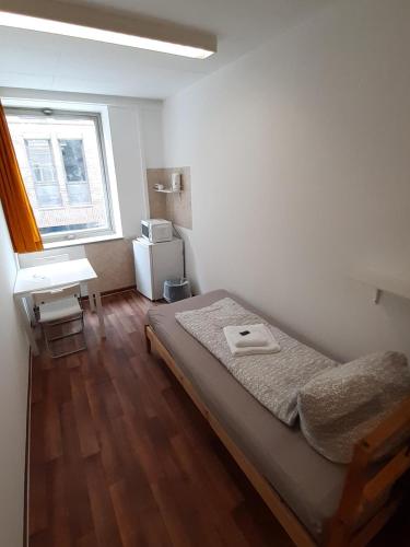 Katil atau katil-katil dalam bilik di 2-Rent Group Hostel Rooms&Apartments GKP2
